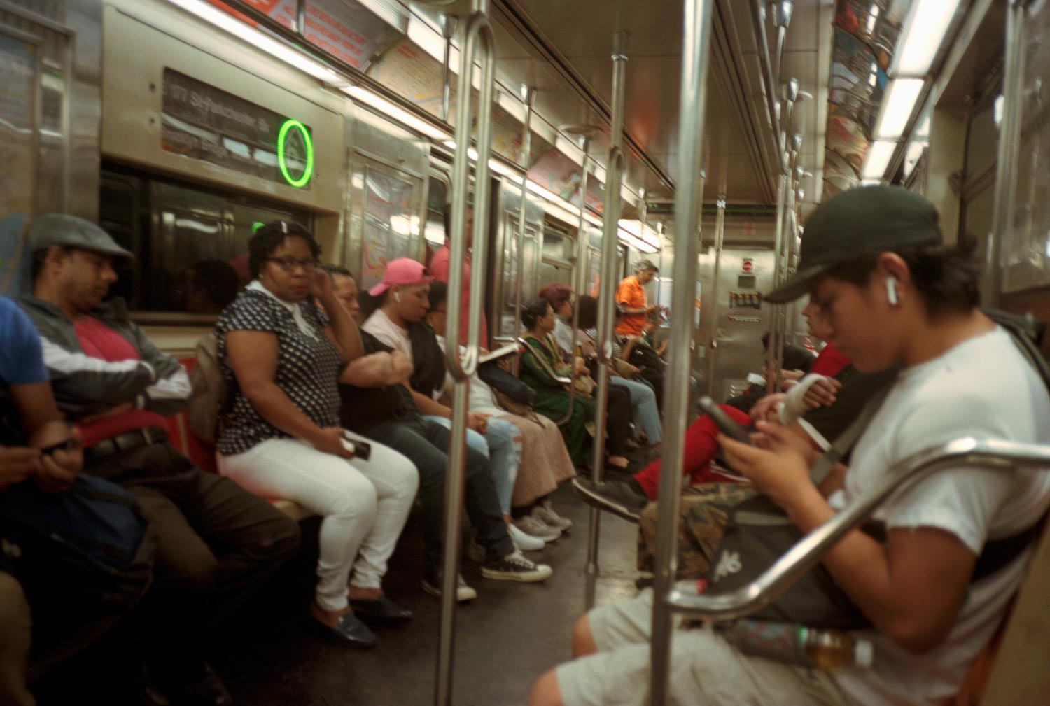 Busy New York subway car, Manhattan, New York.