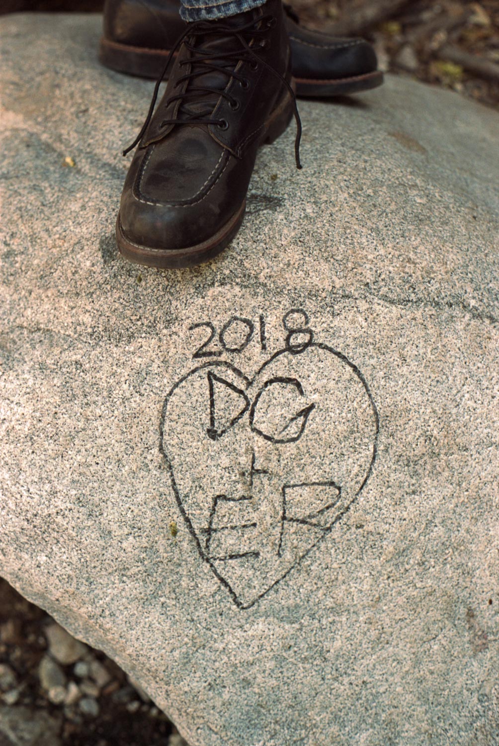 standing over heart shaped graffiti, initialed 2018, Switzer Falls.